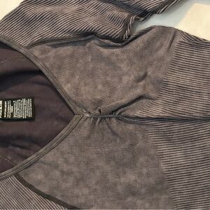 Gray v neck stretchy athletic long sleeve.